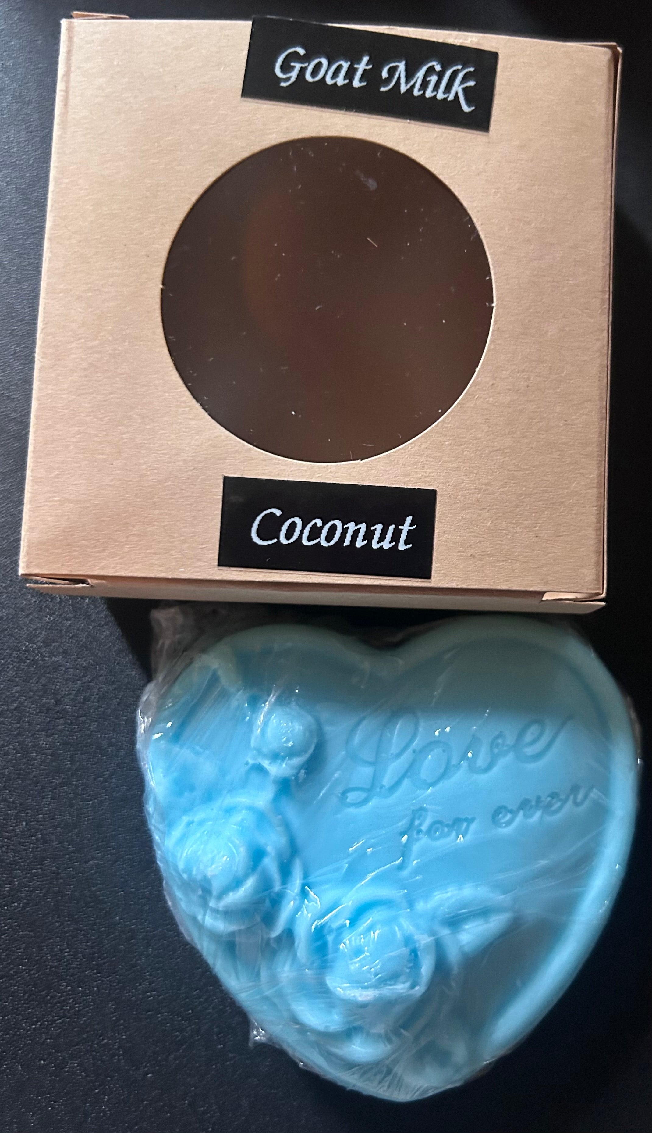 Blue heart-shaped soap with 'Goat Milk Coconut' 