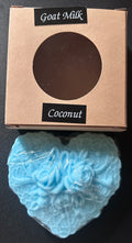 Blue soap bar with decorative design 'Goat Milk Coconut'.